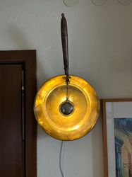 Plug in wall sconce made from antique copper ladle and scoop
