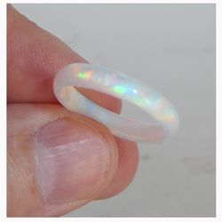 Solid opal ring. Very beautiful ring made of solid synthetic opal.