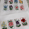 Small cross stitch patterns flowers (11).png