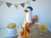 Stuffed seagull toy in blue cap for gift home decor.jpg