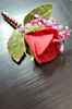 red-rose-wedding-boutonniere-5.jpg