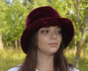 Faux fur bucket hat for women. Fluffy winter hat. A warm, fashion furry hat. Fuzzy bucket hats. Burgundy fur bucket hat.