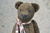 Brown-teddy-bear-jointed-toy