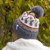 Knitted-jacquard-hat-with-a-pompom-3