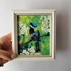 Hand-painted-bird-titmouse-on-a-branch-of-a-cherry-blossom-by-acrylic-paints-1.jpg