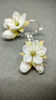 Floral earrings on the front