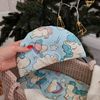 Doll bassinet with linens