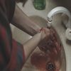 1080x1080 size woman-washing-blood-from-her-hands-under-running-water-convert-video-online.com_.00_00_02_14.Quadro002-1594x1062.jpg