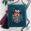 evil eye velvet beaded bag.jpg