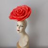 Red fascinator Woman in red.jpg