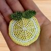 A crochet slice of lemon hair clip pattern