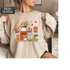 MR-3102023113518-halloween-nurse-sweatshirt-halloween-nurse-pills-spooky-image-1.jpg