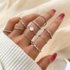 kZcaIPARAM-Fashion-Silver-Color-Metal-Rings-Set-Heart-Butterfly-Leaves-Flower-Crystal-Trendy-Finger-Ring-for.jpg