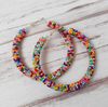 Colorful-beaded-hoop-earrings-multicolor-seed-bead-jewelry-big-hoops-native-american-beadwork-jewelry-handmade-statement-earrings.jpeg