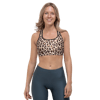 all-over-print-sports-bra-black-front-656dc4e8e7f6c.png