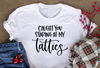 Caught You Staring At My Tatties Shirt, Women's Tattoo themed Funny Graphic t-shirt.jpg