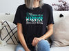 Mama of a Warrior Ovarian Cancer Shirt, Ovarian Cancer Awareness, Ovarian Cancer Survivor Tee, Ovarian Cancer Gift, Teal Cancer Ribbon Shirt.jpg