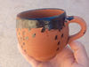 Handmade Moroccan Clay Cup adorned with traditional tar paint.JPG