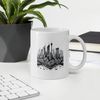 white-glossy-mug-white-11-oz-office-environment-663092265981a.jpg