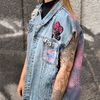 decorated-upcycled-denim-vest-with-trendy-pins.jpg