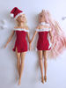 Barbie doll wearing a Christmas dress with a slit