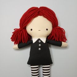 handmade rag doll with red yarn hair