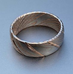 elegant damascus steel wedding ring set with wood case – ideal bands for men and women