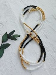 white and gold eyeglasses chain. seed bead sunglasses chain.