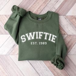 swiftie christmas sweatshirt, ts xmas sweater, the eras tour shirt,christmas taylor shirt,swiftie xmas gifts