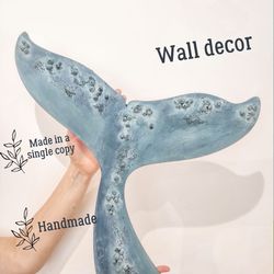 blue wooden whale tail, nautical decor, coastal decor ideas