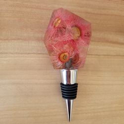 handmade resin wine bottle stopper with embedded dried pink australian flowering gum flowers