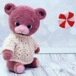 pink teddy bear. soft toy for a child over three years old. handmade toy. teddy bear from threads.