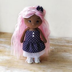 dark skin african american doll with bright pink hair