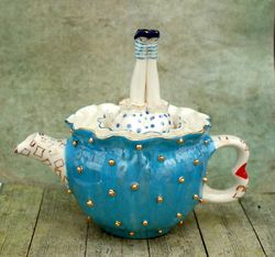 alice teapot, turquoise porcelain sculpture teapot ,whimsical figurine, alice's legs, golden pea texture ,wonderland