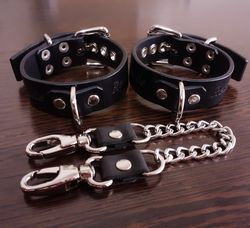 personalized bdsm wrist cuffs with swivel trigger snaps. bdsm cuffs with 2-way сonnector for bondage restraints.