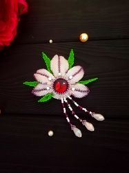 white beaded flower , beaded brooch