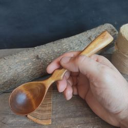 handmade wooden eating spoon from natural birch wood for eating