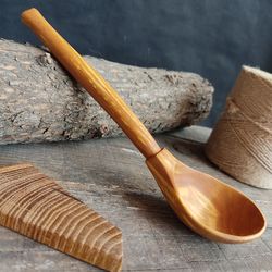 handmade wooden spoon from natural birch wood for eating