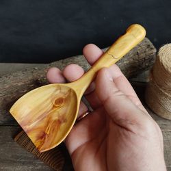 big handmade wooden scoop for bulk products from natural juniper wood