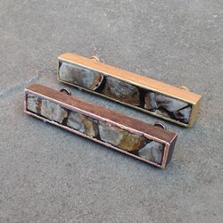 drawer pulls with petrified wood in metal