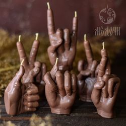 hand mold, candles figures , rock gesture , candle f*ck