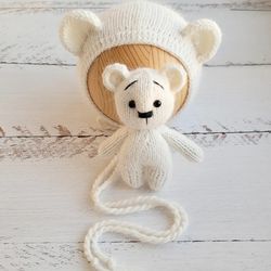 newborn teddy bear bonnet and stuffed toy. knitted baby photo prop