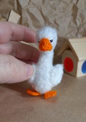 miniature crochet goose. fluffy white goose. crochet bird. white poultry.