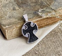 silver cross with a handmade ebony insert is an author's cross