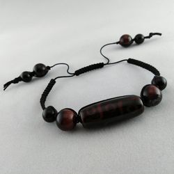 shamballa bracelet with agate dzi bead, obsidian, and "bull's eye"