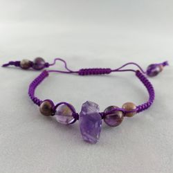 shamballa bracelet with amethyst crystal, cacoxenite amethyst, and tourmaline.