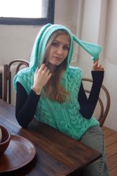 chunky turquoise knitted vest with a hood and bunny ears/jacket with hand-knitted ears