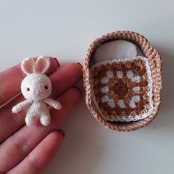 miniature bunny in basket. crochet mini bunny. miniature toy in bed. cute bunny for gift. crochet miniature