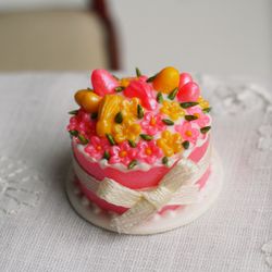 miniature food for dolls, dollhouse pink cake with yellow flowers and bunnies at 1:12 scale