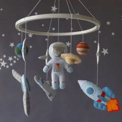 a space baby mobile. spaceship and planets for boy's nursery decor,  outer space orbit handmade mobile